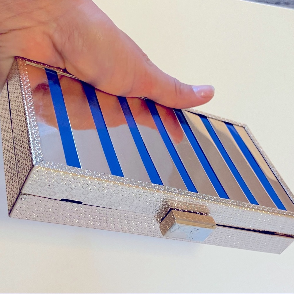 Gold/blue stripe clutch